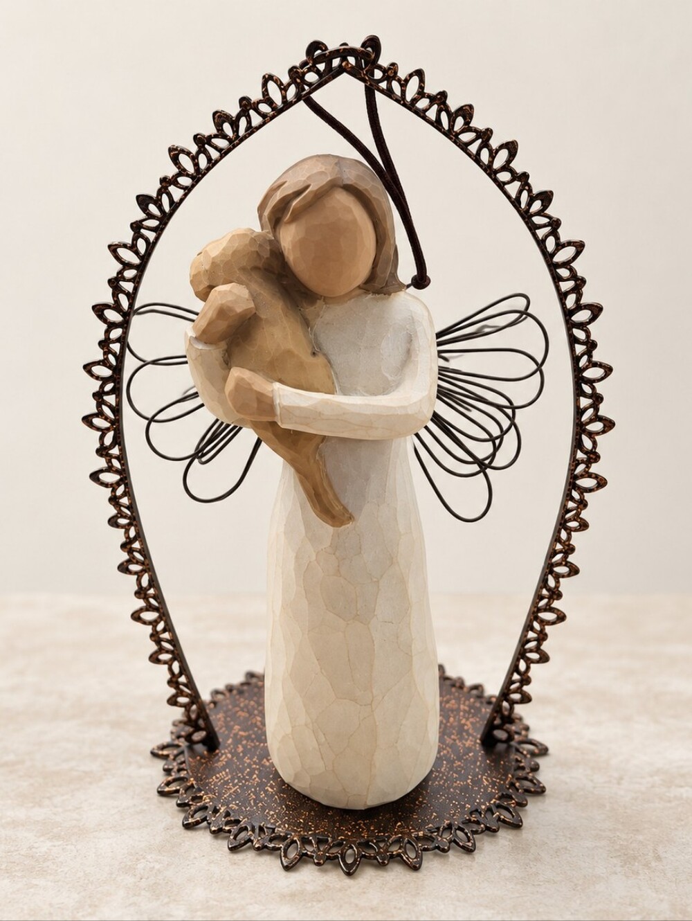 Willow Tree “Angel of Friendship” figurine designed by Susan Lordi.